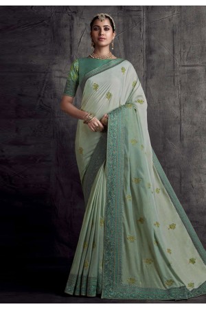 Light green silk saree with blouse 8303