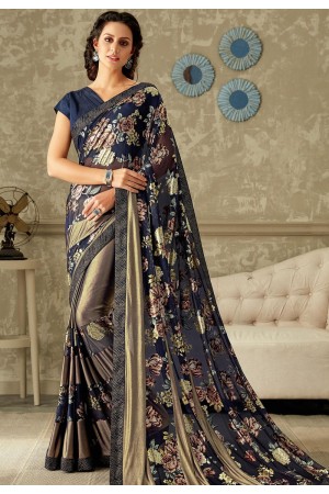 blue printed lycra saree with raw silk blouse 10715