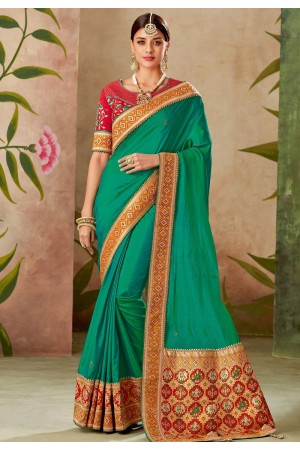 green dual tone silk embroidery saree with raw silk blouse 13113