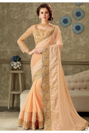 peach embroidered lycra saree with net blouse 10711