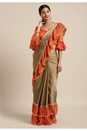 Brown chiffon ruffle border saree with blouse 60840