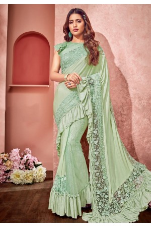 Light green lycra ruffle border saree with blouse 10806
