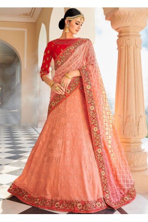 Peach color Lucknowi silk Indian wedding lehenga