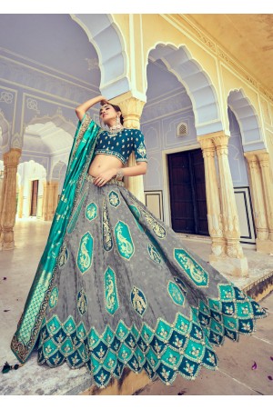 Woven Zari Banarasi silk lehenga choli in Grey and Teal green