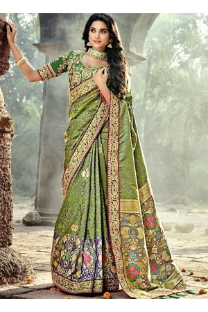 Green color Pure Banarasi Silk wedding wear saree