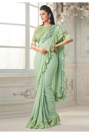 Light green silk ruffle border saree 7109