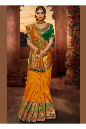 Yellow and green silk wedding wear saree