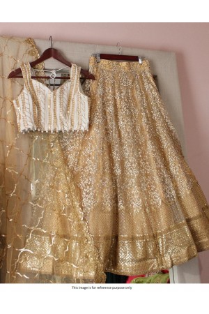 Bollywood Model Cream and gold sequins lehenga choli