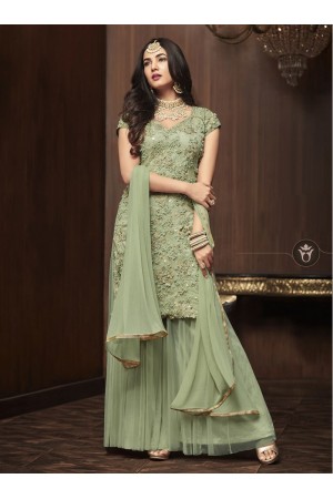 Sonal Chauhan Green net wedding Palazzo kameez