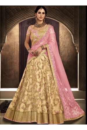 Peach and chiku color netted wedding lehenga