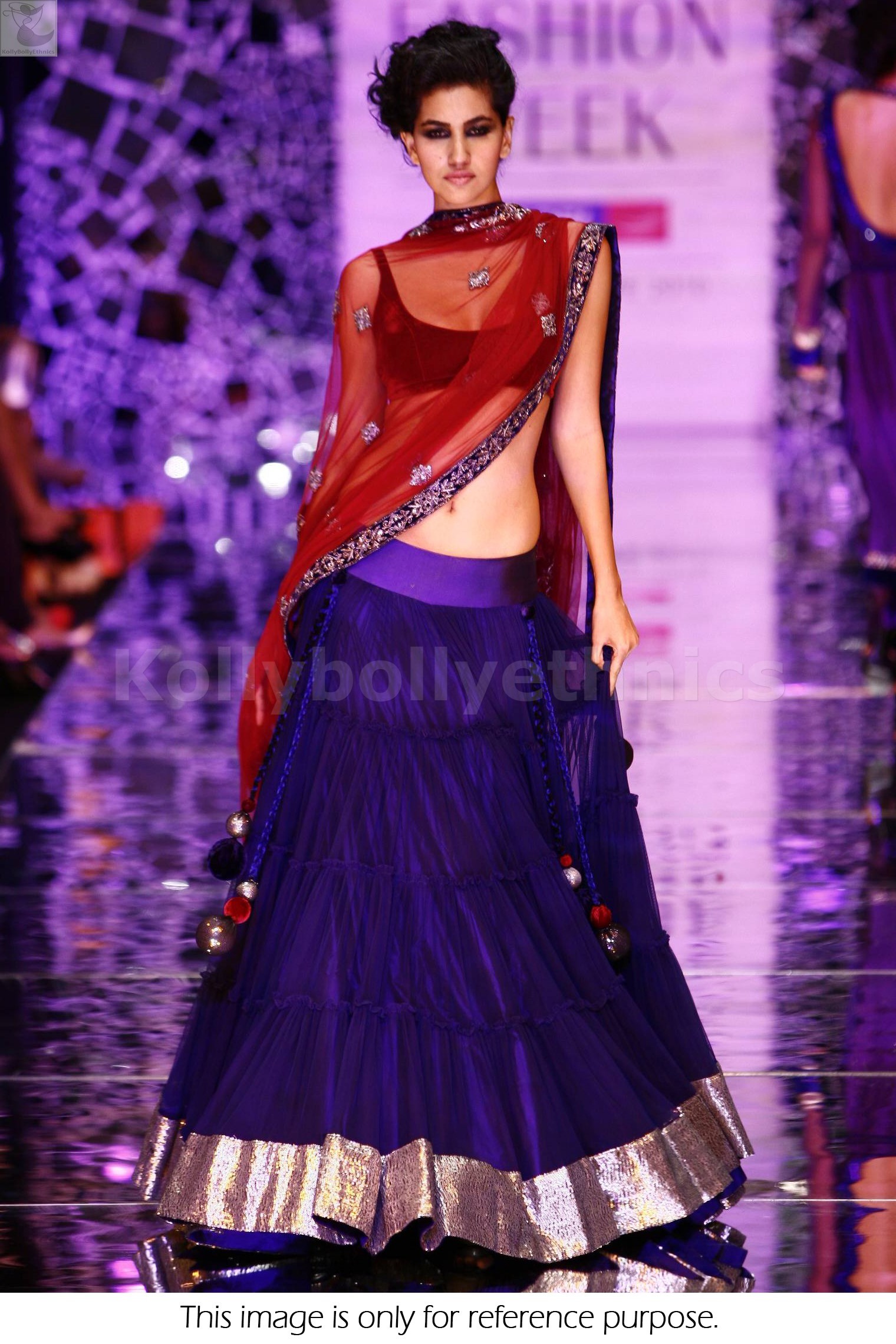 Bollywood Style Lakme fashion week net and velvet lehenga in blue color
