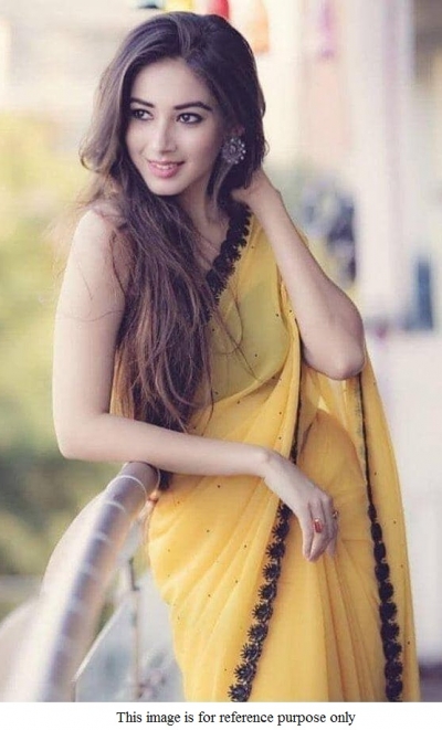 Bollywood model yellow moti work georgette saree