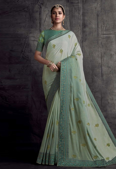 Light green silk saree with blouse 8303