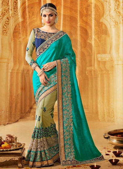 Turquoise art silk wedding wear saree