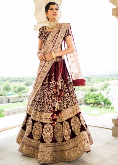 Inspired Maroon velvet base heavy dori work wedding lehenga