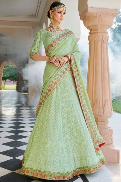 Mint green Lakhnavi silk Indian wedding lehenga