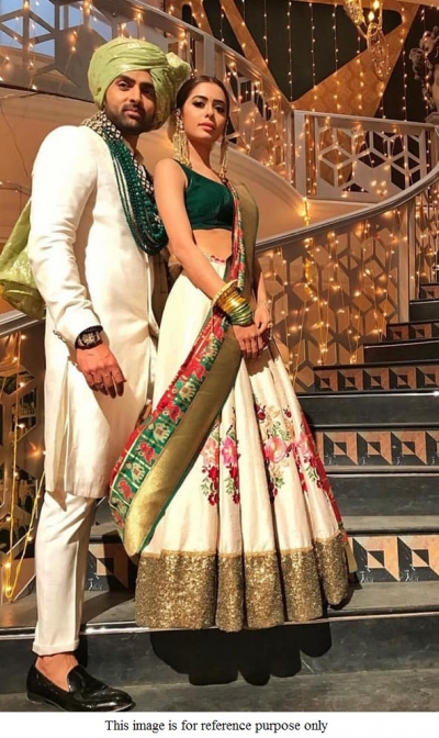 Bollywood model cream green and red crepe silk lehenga choli
