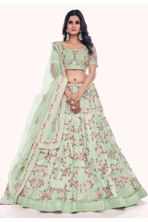 Soft net circular lehenga choli in Pista green colour 36013