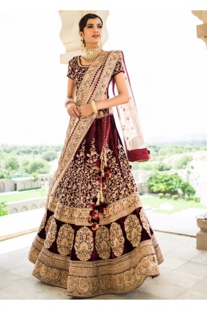 Inspired Maroon velvet base heavy dori work wedding lehenga