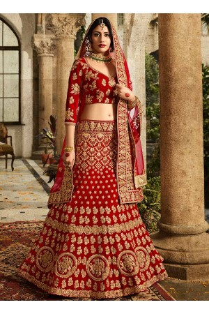 Red and orange silk velvet and net wedding lehenga choli