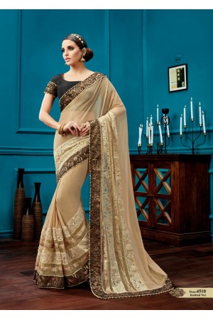 Beige knitted net wedding wear saree