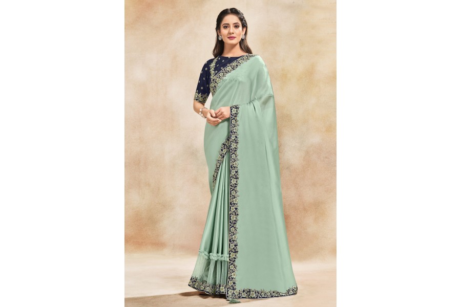 Women's Tissue Sea Green Woven Design Designer Saree With Blouse Piece