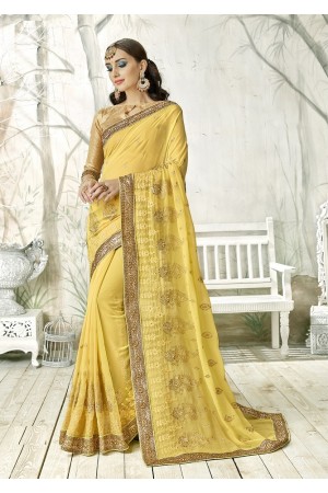 Pale yellow designer fancy party wear saree 90008