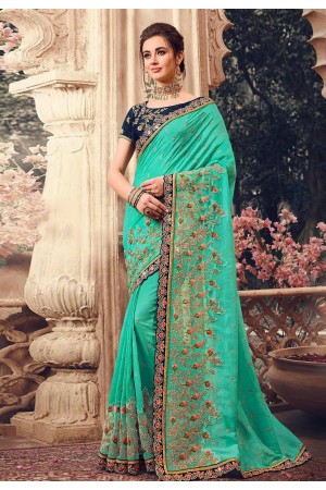 Green silk embroidered party wear saree 1070