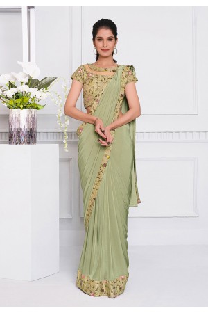 Light green lycra designer saree 21507