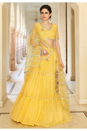 Yellow net frilled lehenga choli 1004