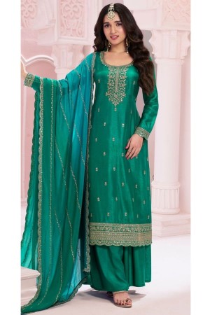 Vichitra silk embroidered palazzo suit in Rama Green colour 69452