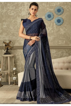 blue embroidered lycra saree with raw silk blouse 10719