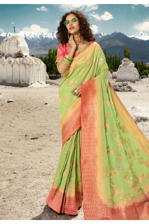 Green silk embroidered festival wear saree 13273