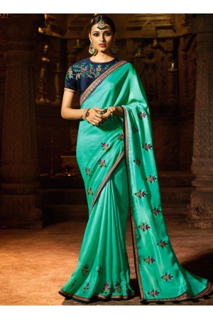 Turquoise fancy fabric embroidered work designer saree 74106