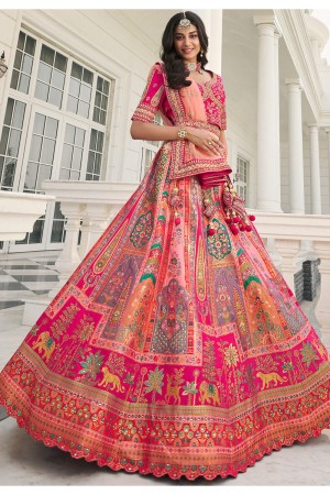 Woven Jacquard silk lehenga choli in Pink and Peach color