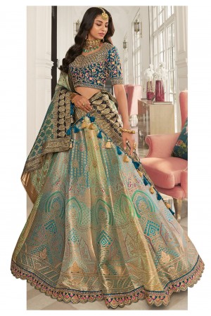 Woven Jacquard silk lehenga choli in Teal blue and pastel green