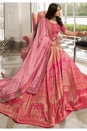 Woven Jacquard silk lehenga choli in Peach and Pink color