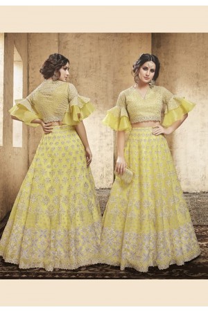 yellow net lehenga choli with layered frill sleeve 28007