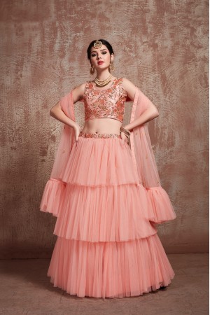 Peach color net Ruffle wedding lehenga