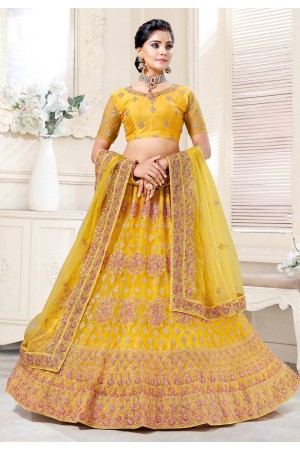 Yellow net wedding lehenga choli 136736