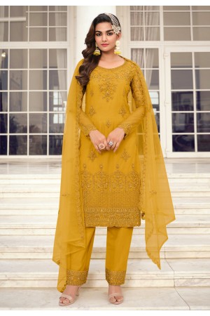 Net embroidered pant style suit in Mustard colour 3403