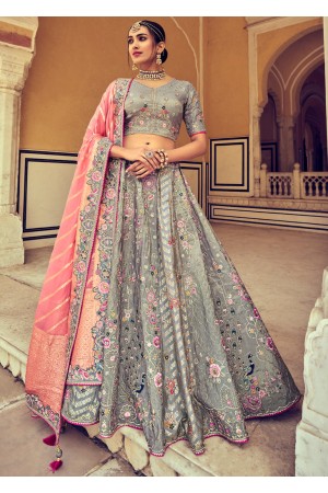 Woven Zari Banarasi silk lehenga choli in Grey color