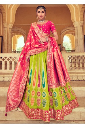 Woven Zari Banarasi silk lehenga choli in Green and Pink