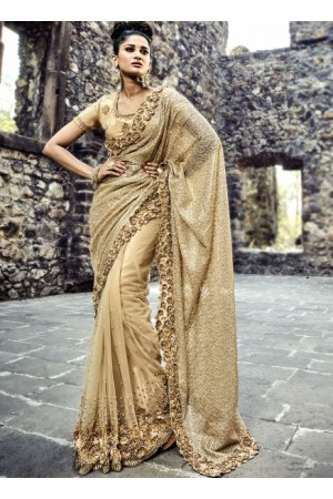 Gold color imported fabric and net wedding wear saree