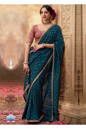 Teal blue and red color Pure viscous crepe zari butta weaving wedding saree 6502