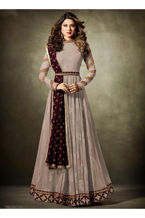 Jennifer Winget Beige and Maroon Lycra jacquard anarkali