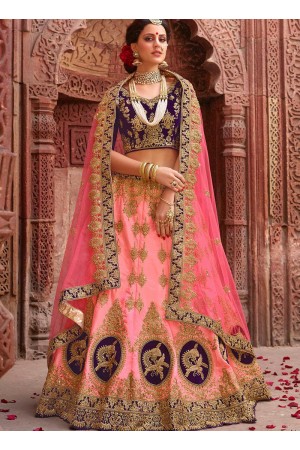 Peach and purple satin silk and net wedding lehenga