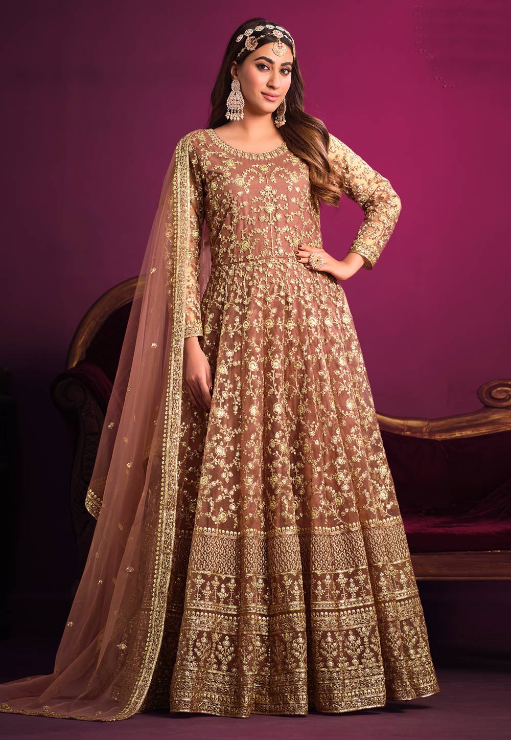 Golden Gown, Pattern : Embroidered, Technics : Machine Made at Best Price  in Surat