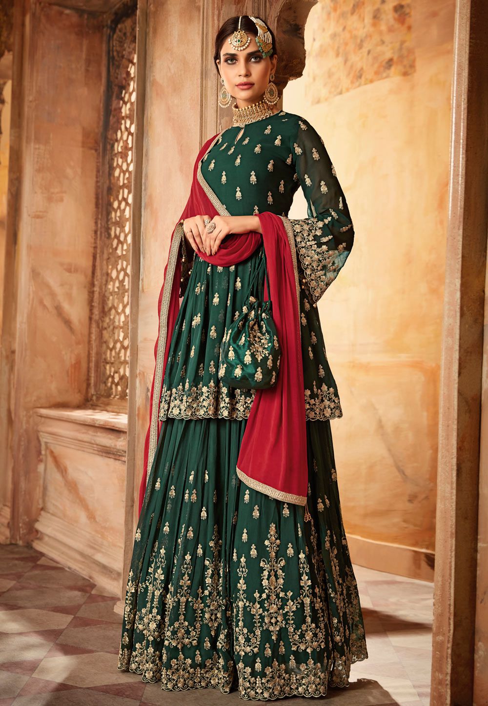 red and green bridal lehenga