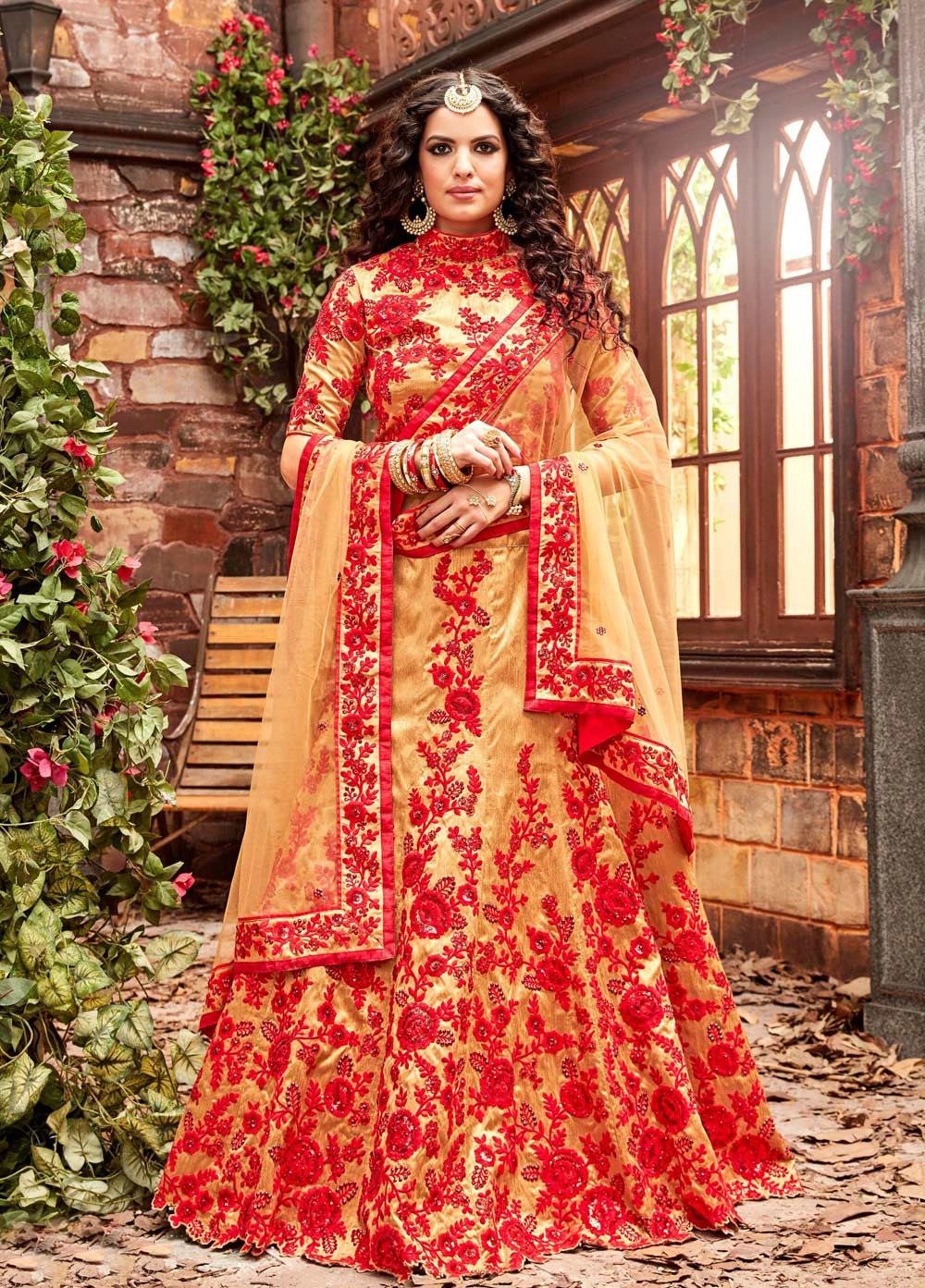 bridal lehenga in red and golden colour